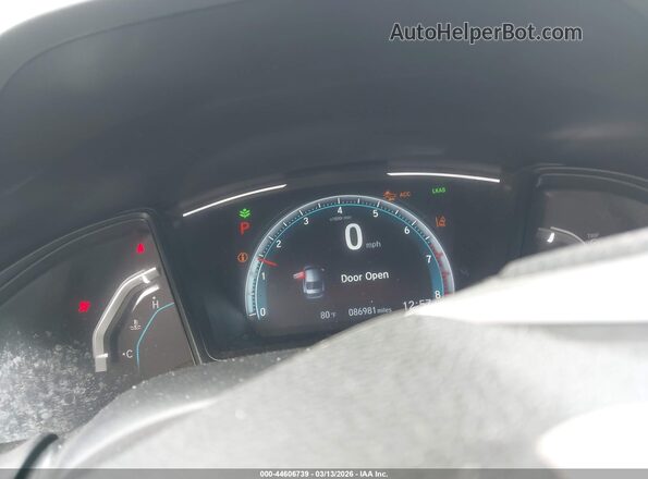 2HGFC2F62MH529283 2021 HONDA CIVIC Red Vista de los asientos traseros