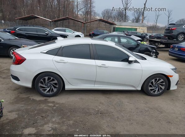 2HGFC2F74JH528219 2018 HONDA CIVIC White უკანა სალონის ხედი