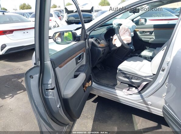 2HKRW1H52MH423019 2021 HONDA CR-V Silver Front interior view