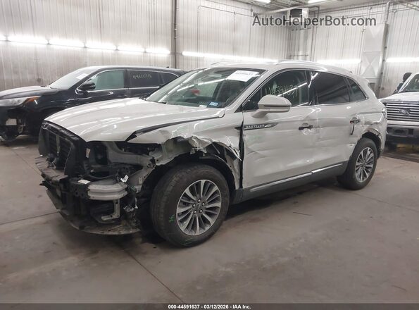 2LMPJ6J98NBL00869 2022 LINCOLN NAUTILUS Cream Vista tres cuartos delantera izquierda