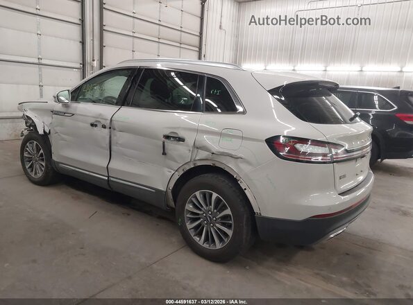 2LMPJ6J98NBL00869 2022 LINCOLN NAUTILUS Cream Trasero izquierdo