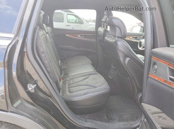 2LMPJ6LR6GBL60648 2016 LINCOLN MKX Black Vista de los asientos traseros