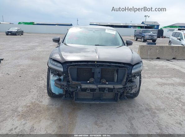 2LMPJ8K94KBL31395 2019 LINCOLN NAUTILUS Коричневый Вид задней части салона