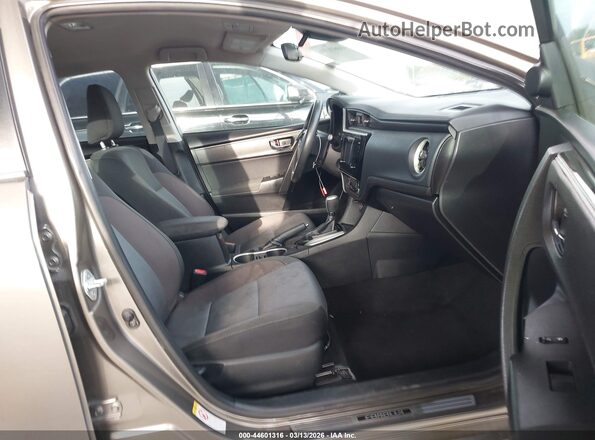 2T1BURHE0HC779757 2017 TOYOTA LL Желто-коричневый Вид салона спереди