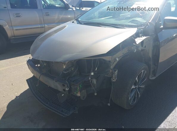 2T1BURHE1HC772803 2017 TOYOTA LL Gray Вид спереду
