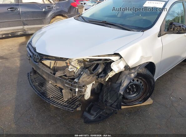 2T1BURHE2GC602593 2016 TOYOTA LL Silver Front view