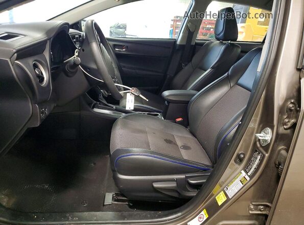2T1BURHE4HC921124 2017 TOYOTA LL Tan Widok wnętrza z przodu