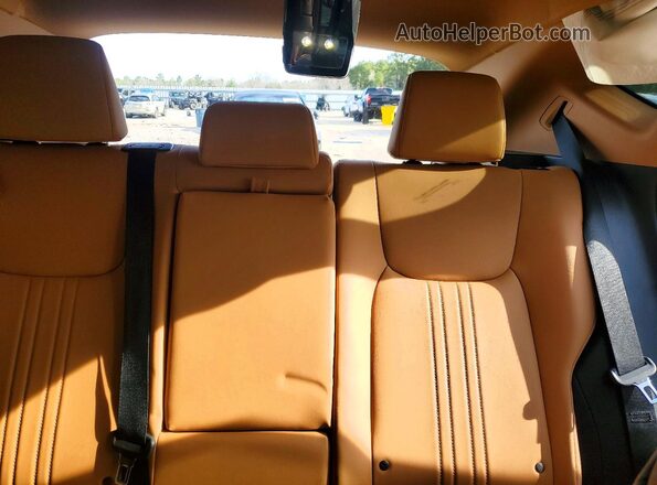 2T2ADCAZXRC009049 2024 LEXUS NX Gray Vista de los asientos traseros