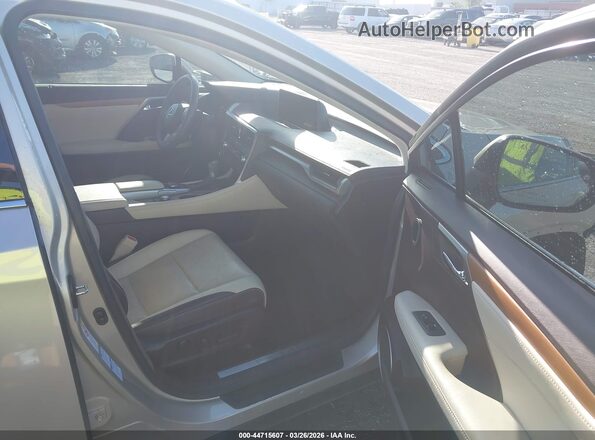 2T2BGMCA8GC007760 2016 LEXUS RX 450H Золотой Вид салона спереди