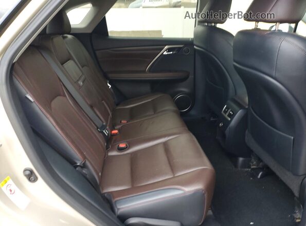 2T2BZMCA0HC066474 2017 LEXUS RX Gold Widok wnętrza z tyłu