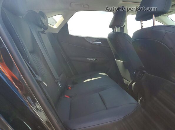 2T2GDCAZ7NC001852 2022 LEXUS NX Black Widok wnętrza z tyłu