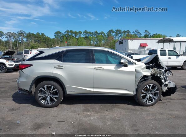 2T2HGMDA6LC043904 2020 LEXUS RX 450H Champagne Widok wnętrza z tyłu