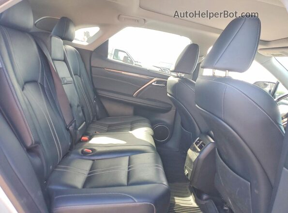 2T2JZMAA2LC154109 2020 LEXUS RX White Vista interior trasera