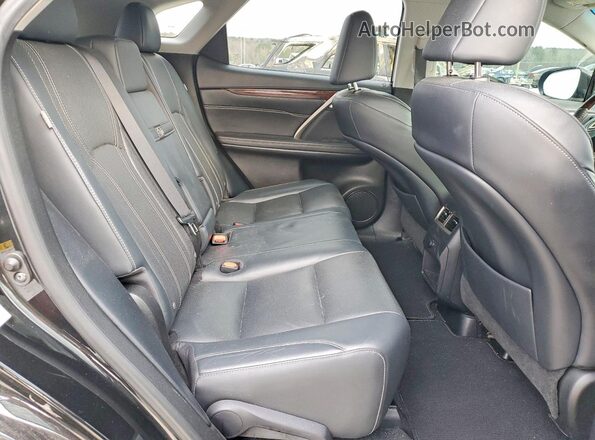 2T2ZZMCA3JC096332 2018 LEXUS RX Black Vista interior trasera