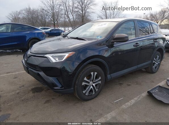 2T3BFREV1JW736362 2018 TOYOTA LE Black Przód lewy