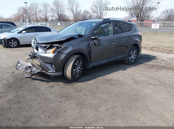 2T3BFREV2HW598129 2017 TOYOTA LE Gray Przód lewy