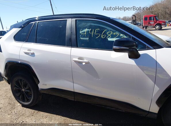 2T3E6RFV1NW037850 2022 TOYOTA RAV4 HYBRID White Вид задньої частини салону