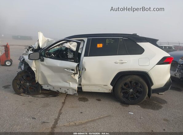 2T3E6RFV6NW035737 2022 TOYOTA RAV4 HYBRID White Rear interior view