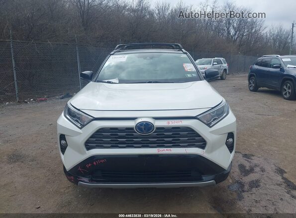 2T3EWRFV0KW027239 2019 TOYOTA RAV4 HYBRID White Widok wnętrza z tyłu