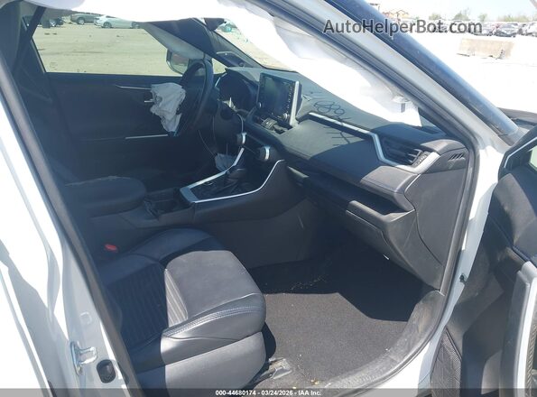 2T3EWRFV1KW041943 2019 TOYOTA RAV4 HYBRID White წინა სალონის ხედი