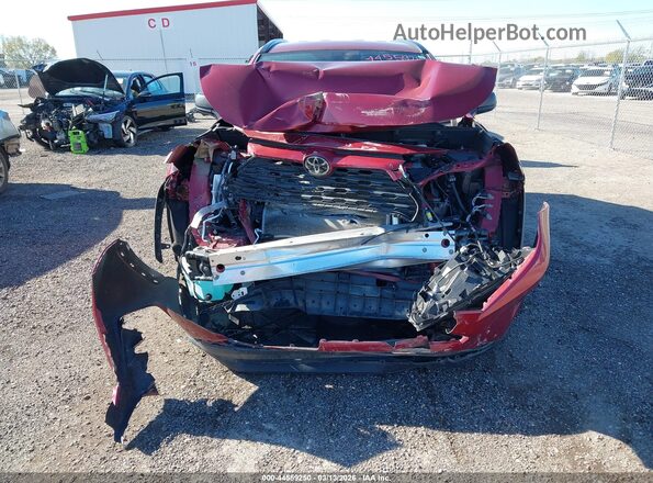 2T3H1RFVXMW127038 2021 TOYOTA LE Burgundy Vista interior trasera