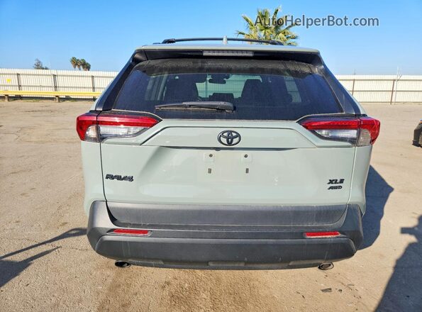 2T3P1RFV4NW324462 2022 TOYOTA LE Silver Rear view