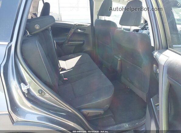 2T3RFREV1JW696654 2018 TOYOTA RAV4 Gray Vista de la etiqueta del VIN
