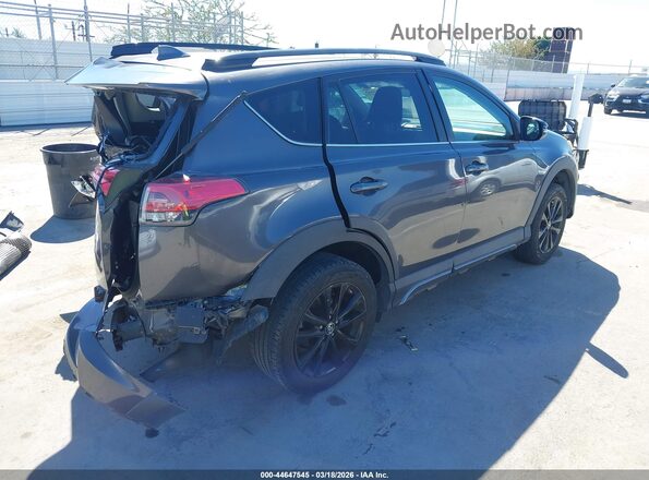 2T3RFREV1JW696654 2018 TOYOTA RAV4 Gray Trasero derecho