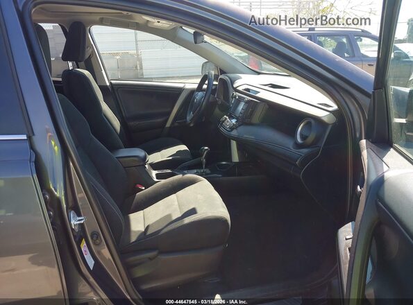 2T3RFREV1JW696654 2018 TOYOTA RAV4 Gray Vista interior delantera