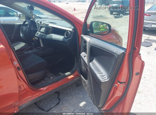 2T3RFREV9GW495674 2016 TOYOTA LE Orange Front interior view