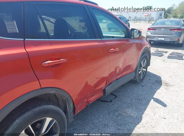 2T3RFREV9GW495674 2016 TOYOTA LE Orange Front view