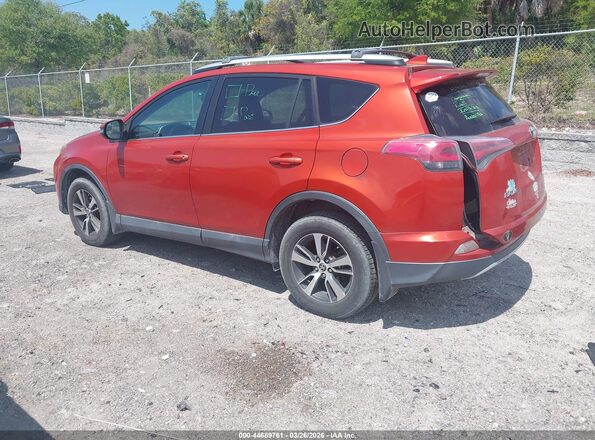 2T3RFREV9GW495674 2016 TOYOTA LE Orange Rear left