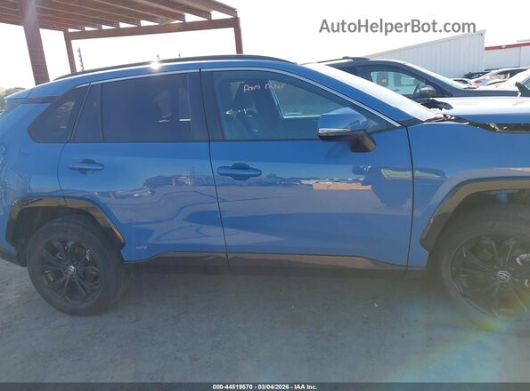 2T3T6RFV7NW033826 2022 TOYOTA RAV4 HYBRID Blue Vista interior trasera