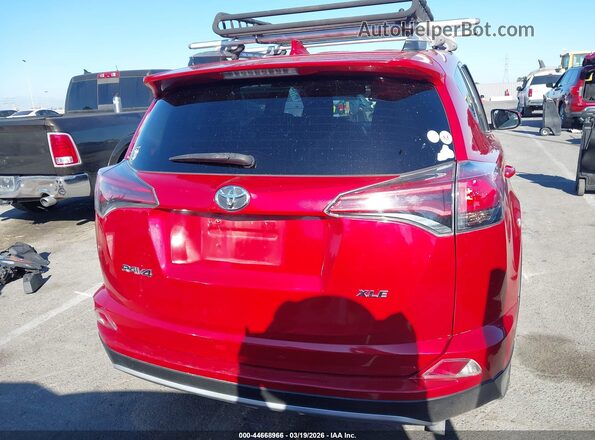 2T3WFREV1GW281541 2016 TOYOTA LE Red 