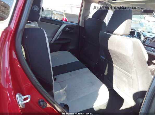 2T3WFREV1GW281541 2016 TOYOTA LE Red Вид наклейки з VIN-кодом