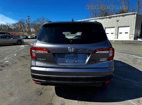 5FNYF6H20MB038975 2021 HONDA PILOT Black Front interior view