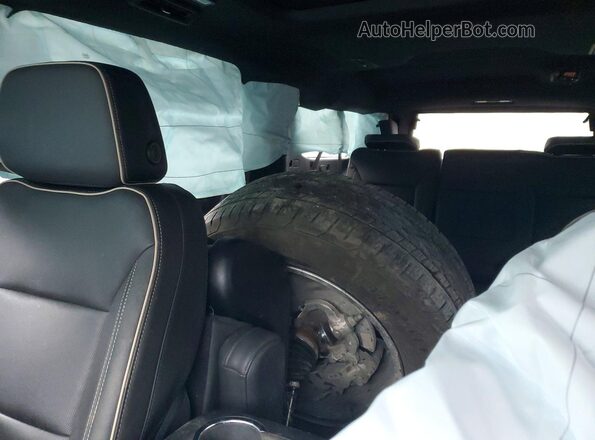 1GNSKFKDXRR298949 2024 CHEVROLET SUBURBAN Черный Вид задних сидений