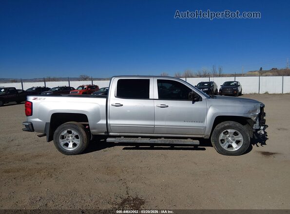 3GCUKREC7JG615161 2018 CHEVROLET SILVERADO Silver Widok wnętrza z tyłu