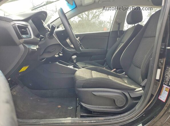 3KPA24AD6ME382832 2021 KIA RIO Black Front interior view