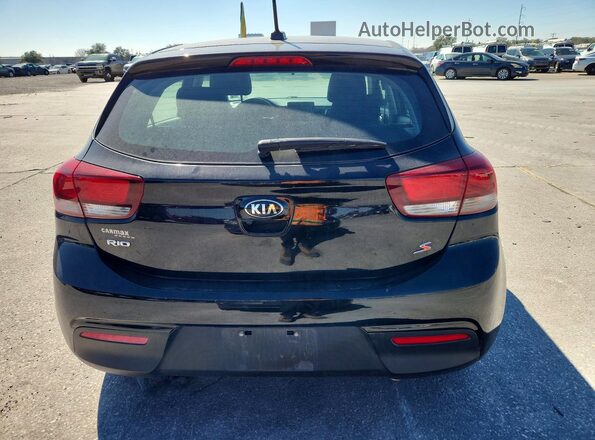 3KPA25AD6ME415592 2021 KIA RIO Black Rear view