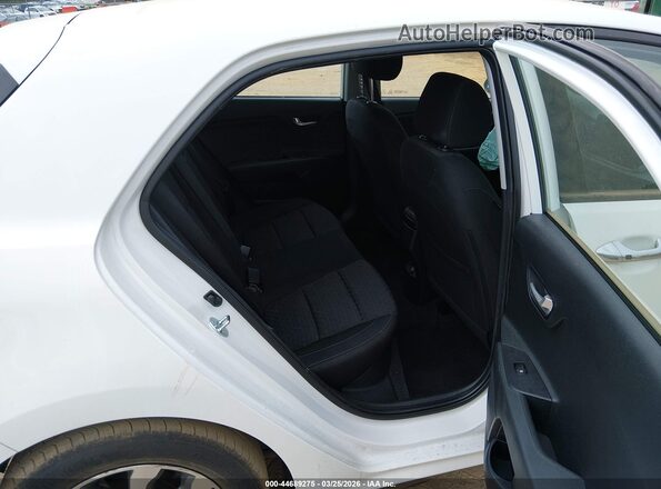 3KPA25AD9PE558654 2023 KIA RIO 5-DOOR White Widok naklejki z numerem VIN