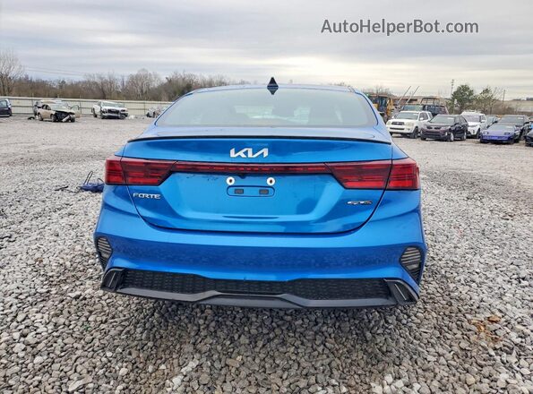 3KPF54AD8RE704049 2024 KIA FORTE Blue Вид ззаду