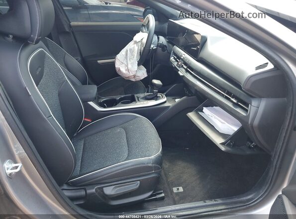 3KPFW4DE3SE209085 2025 KIA K4 Gray Front interior view