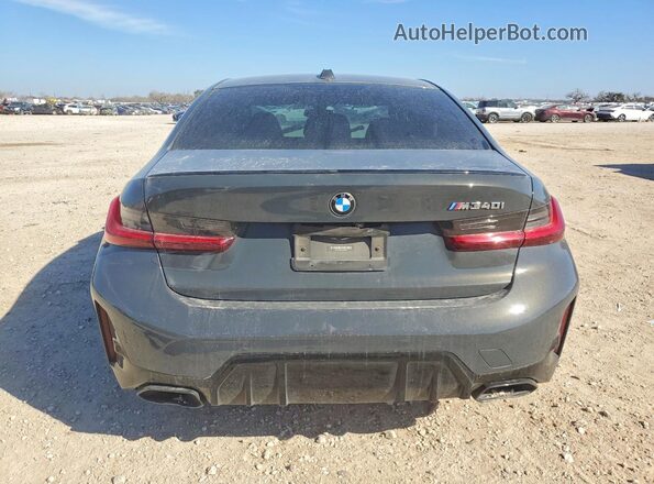 3MW49FS00P8D27454 2023 BMW M3 Gray Հետևի տեսք
