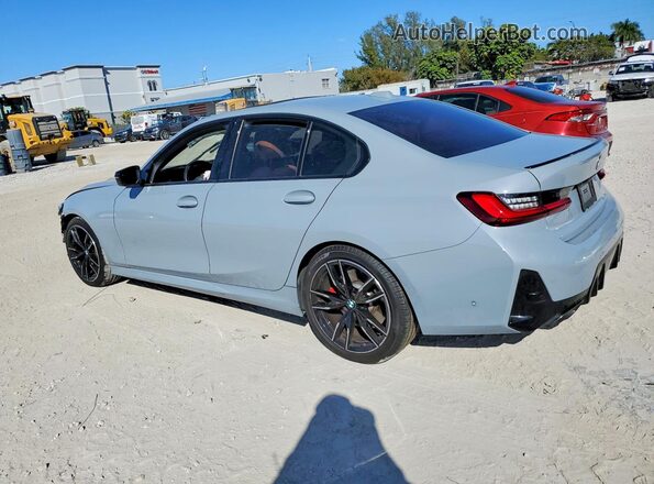 3MW49FS00R8E78054 2024 BMW M3 Teal Trasero izquierdo