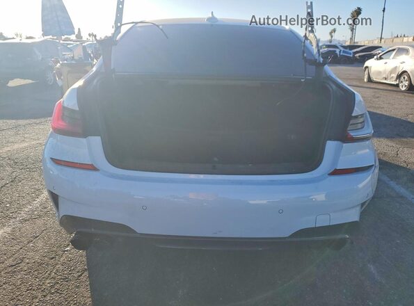 3MW5U7J07M8C15093 2021 BMW M3 White Հետևի տեսք