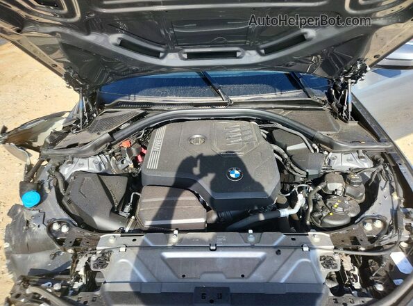 3MW69FF05R8E57557 2024 BMW 3 SERIES Gray Widok wnętrza z tyłu