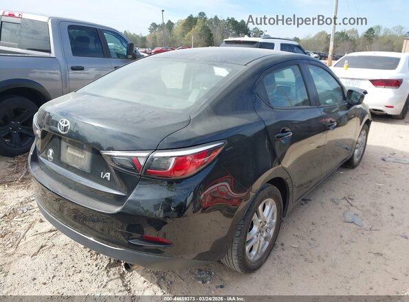 3MYDLBYV3HY155990 2017 TOYOTA YARIS IA Black Rear right