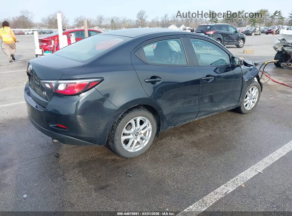 3MYDLBYV4HY166710 2017 TOYOTA YARIS IA Black Trasero derecho