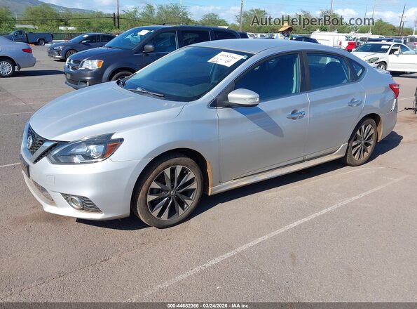 3N1AB7AP8JY320289 2018 NISSAN SENTRA Серебряный Передняя левая четверть